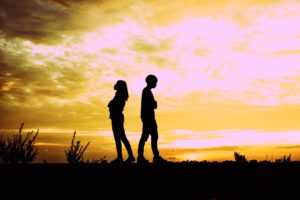 Silhouette of couple in conflict